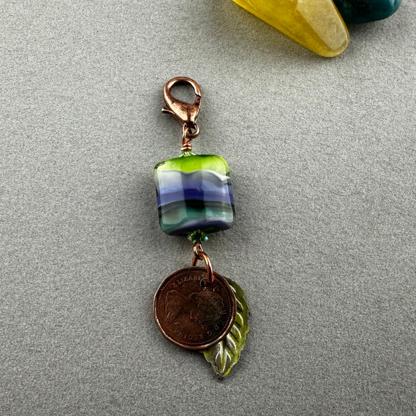 LUCKY PENNY CHARM WITH HANDMADE GLASS BEAD AND LEAF
