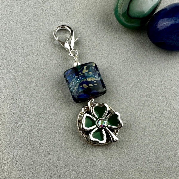 LUCKY SILVER CHARM DROP WITH A HANDMADE GLASS BEAD AND FOUR LEAF CLOVER CHARM