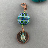 LUCKY PENNY CHARM WITH HANDMADE GLASS BEAD AND SCARAB CHARM
