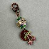 LUCKY PENNY CHARM WITH A HANDMADE GLASS BEAD AND CHERRY CHARM