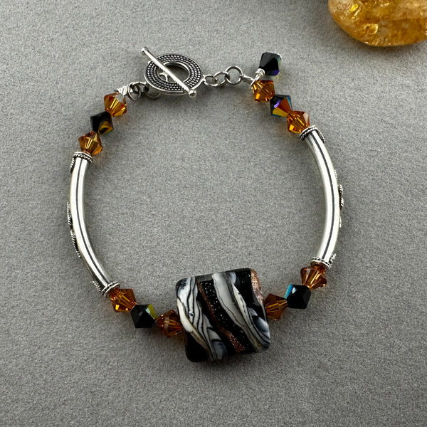 ZEBRA TRAIL ~ STERLING SILVER BRACELET WITH HANDMADE GLASS BEAD