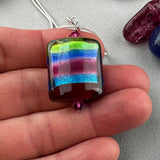 RAINBOW RIBBON ~ HANDMADE GLASS PENDANT ON AN 18