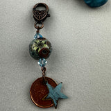 LUCKY PENNY CHARM WITH HANDMADE GLASS BEAD AND STAR CHARM II