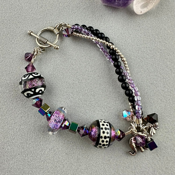 PURPLE PEOPLE EATER ~ TREASURE BRACELET