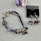 PURPLE PEOPLE EATER ~ HANDMADE GLASS BEAD EARRINGS
