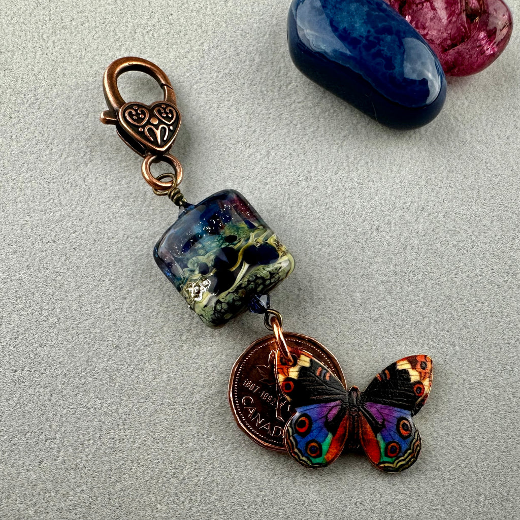 LUCKY PENNY CHARM WITH HANDMADE GLASS BEAD AND BUTTERFLY CHARM