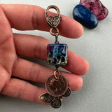 LUCKY PENNY CHARM WITH HANDMADE GLASS BEAD AND BUTTERFLY CHARM