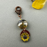 LUCKY PENNY CHARM WITH HANDMADE GLASS BEAD AND SUNFLOWER CHARM