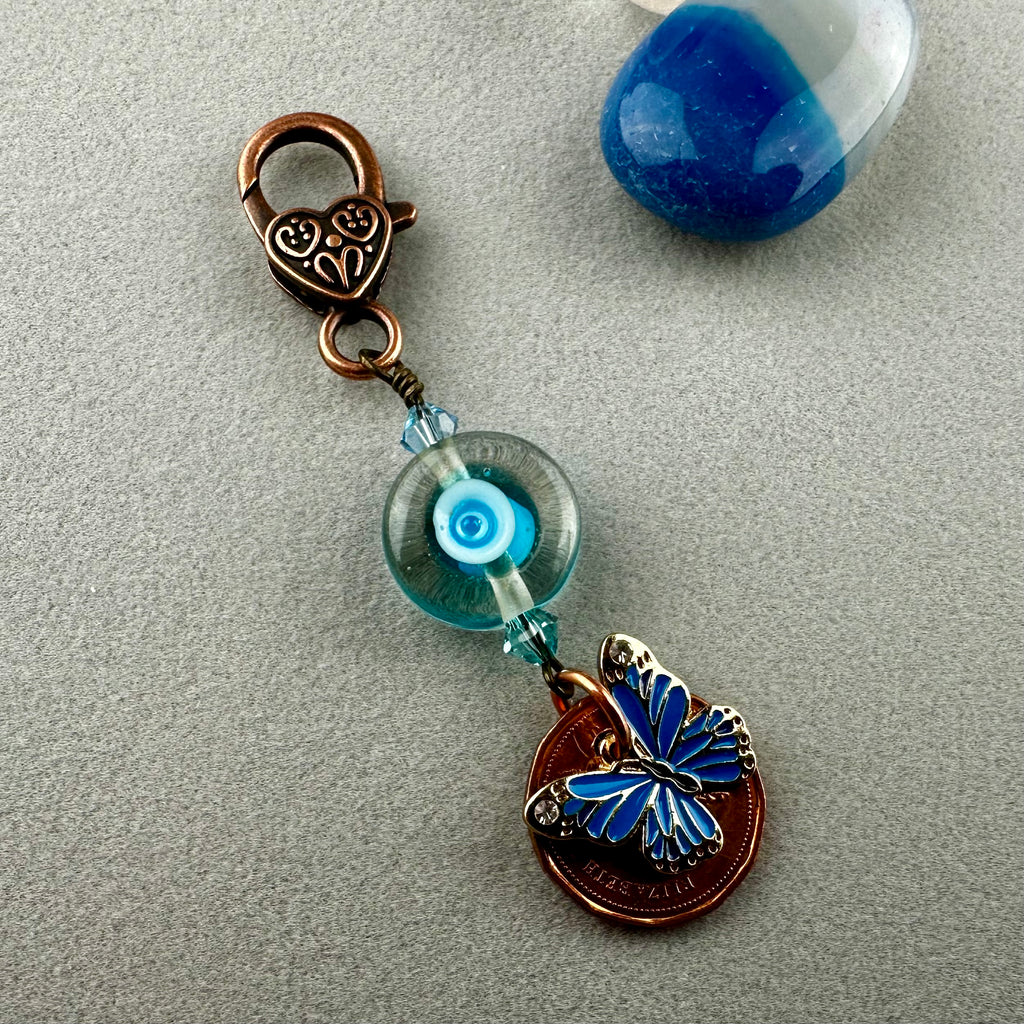 LUCKY PENNY CHARM WITH HANDMADE GLASS BEAD AND BUTTERFLY CHARM V