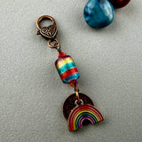 LUCKY PENNY CHARM WITH HANDMADE GLASS BEAD AND RAINBOW CHARM