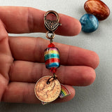 LUCKY PENNY CHARM WITH HANDMADE GLASS BEAD AND RAINBOW CHARM