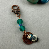 LUCKY PENNY CHARM WITH HANDMADE GLASS BEAD AND BABUSHKA DOLL CHARM