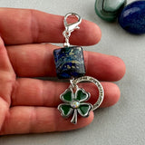 LUCKY SILVER CHARM DROP WITH A HANDMADE GLASS BEAD AND FOUR LEAF CLOVER CHARM