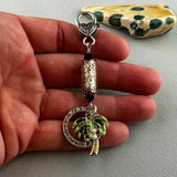 LUCKY SILVER CHARM DROP WITH A HANDMADE GLASS BEAD AND PALM TREE CHARM