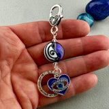 LUCKY SILVER CHARM DROP WITH A HANDMADE GLASS BEAD AND EVIL EYE CHARM