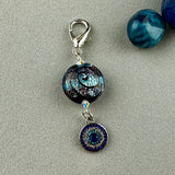 LUCKY SILVER CHARM DROP WITH A HANDMADE GLASS BEAD AND A EVIL EYE CHARM II