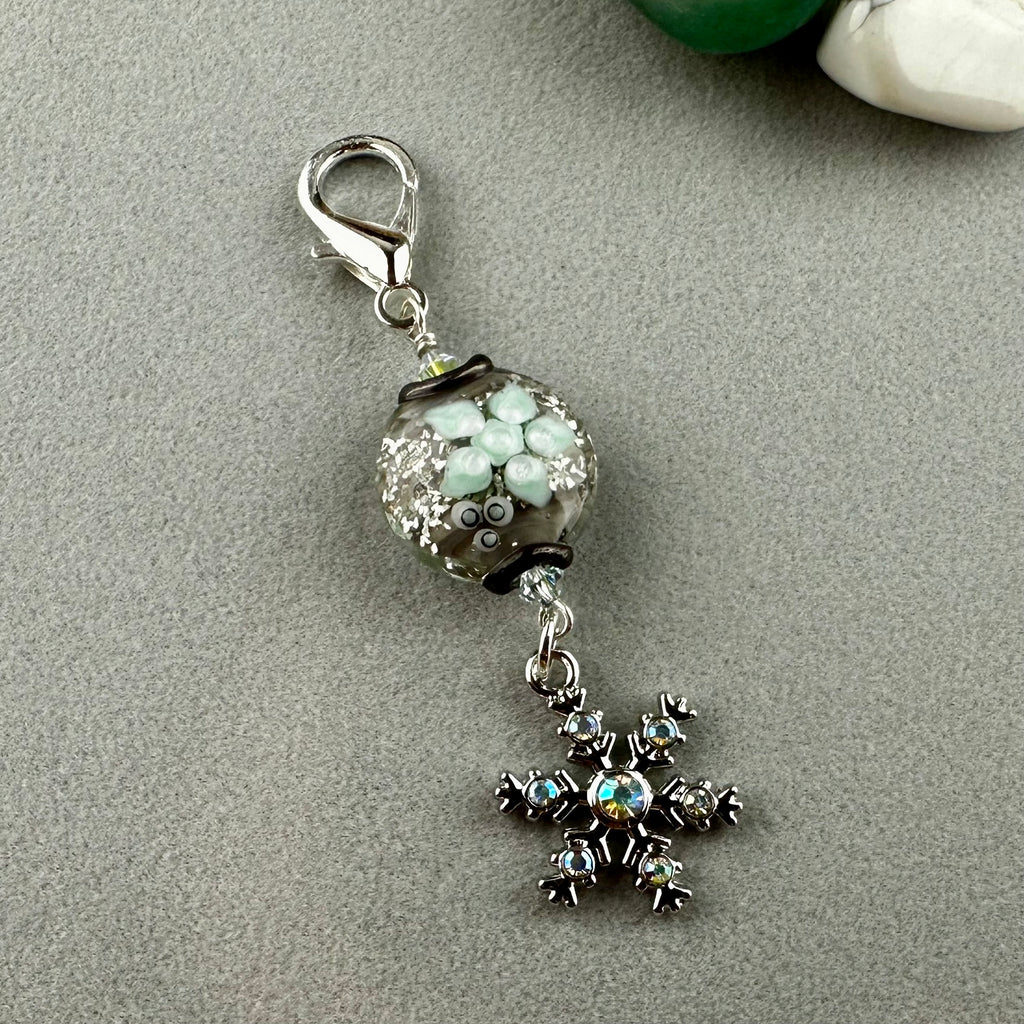 LUCKY SILVER CHARM DROP WITH A HANDMADE GLASS BEAD AND A SPARLY SNOWFLAKE CHARM