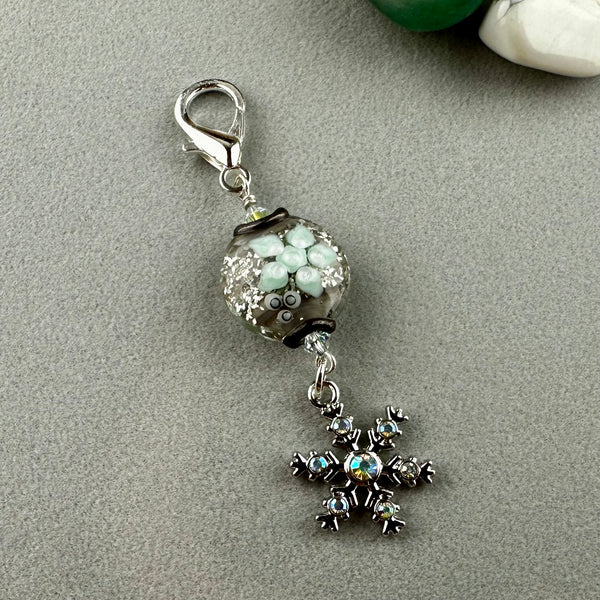 LUCKY SILVER CHARM DROP WITH A HANDMADE GLASS BEAD AND A SPARLY SNOWFLAKE CHARM
