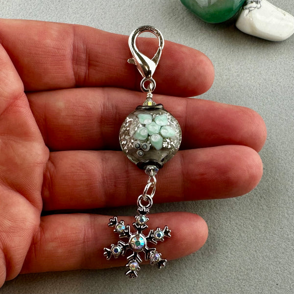 LUCKY SILVER CHARM DROP WITH A HANDMADE GLASS BEAD AND A SPARLY SNOWFLAKE CHARM