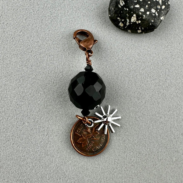 LUCKY PENNY CHARM WITH FACETED BLACK BALL AND SILVER SUN CHARM